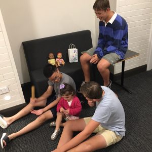 Year 9 play with youngest housemate